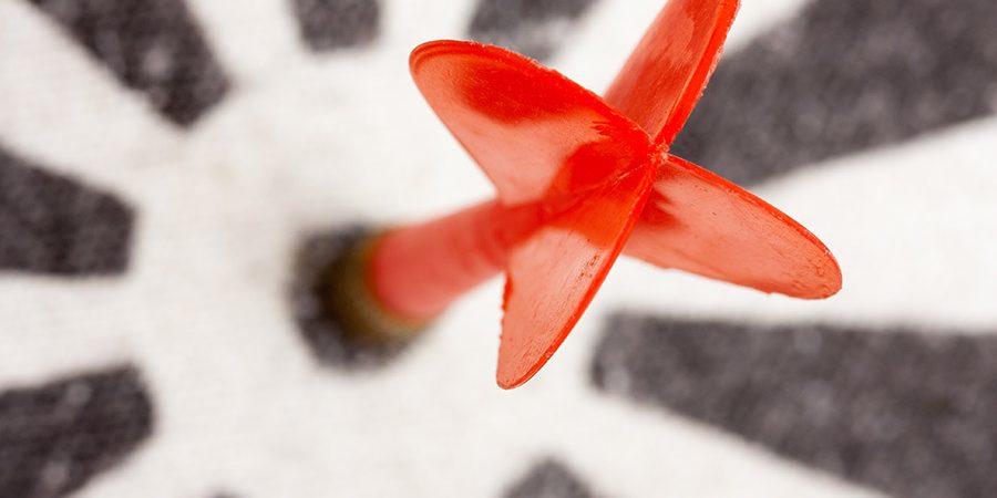 red-dart-hitting-the-target-P9P9BRJ